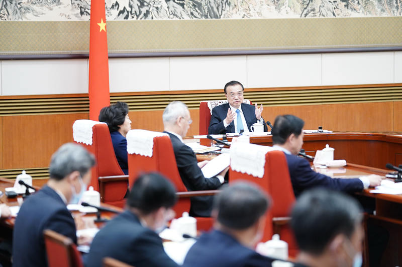 Gabinete chinês discute projetos do relatório de trabalho do governo e do 14o Plano Quinquenal