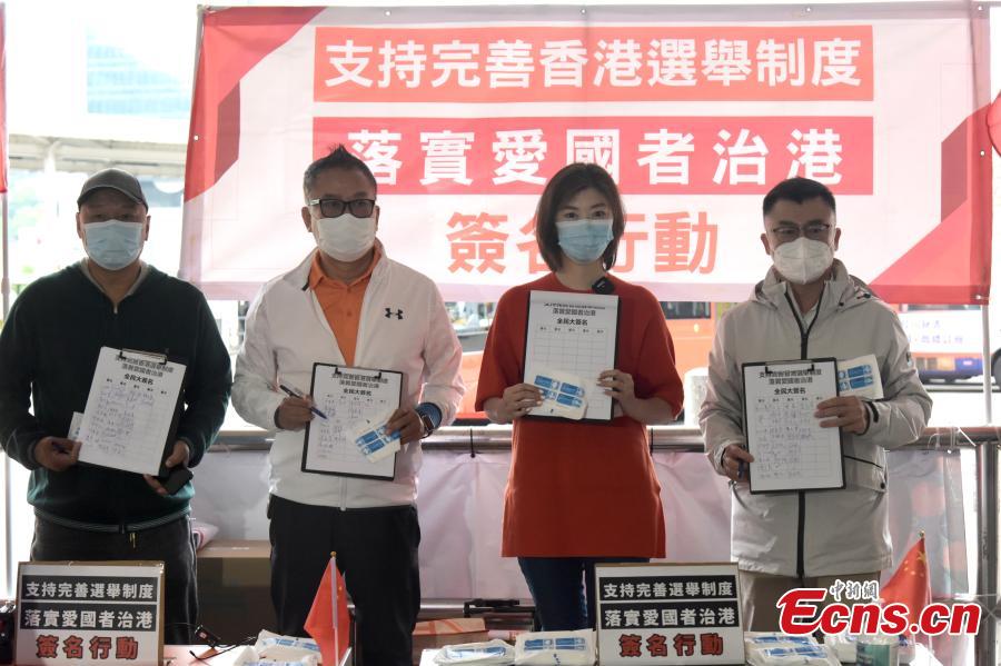 Cidad?os de Hong Kong expressam apoio ao aprimoramento do sistema eleitoral da RAEHK 