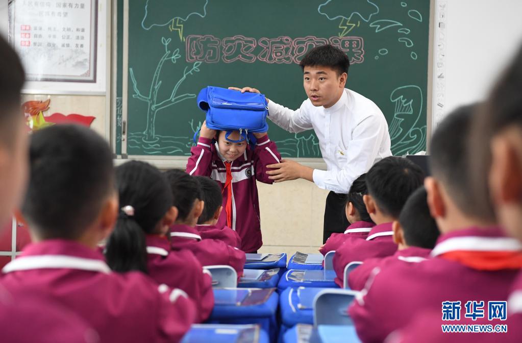 Escolas chinesas realizam atividades sobre preven??o e mitiga??o de desastres