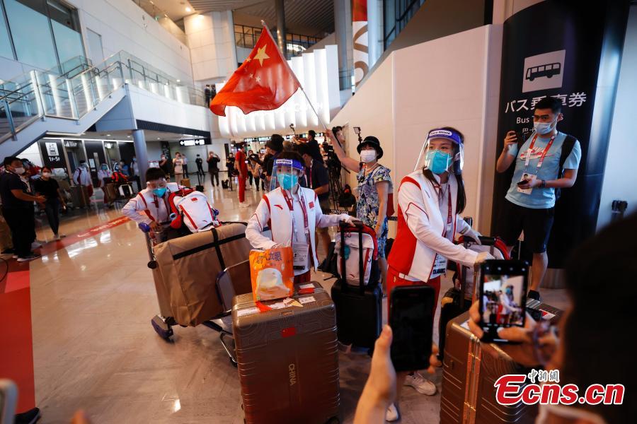 Membros da delega??o esportiva chinesa chegam a Tóquio
