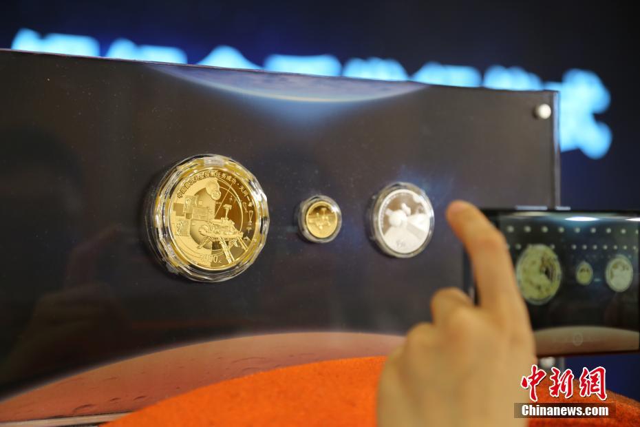 China emite moedas comemorativas em homenagem ao sucesso da miss?o do país à Marte