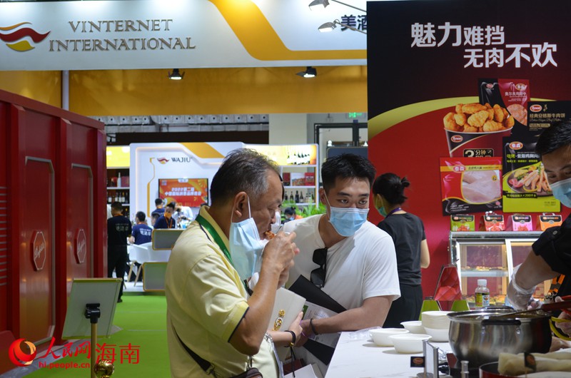 Iguarias globais atraem visitantes na 2a Exposi??o Internacional de Produtos de Consumo da China