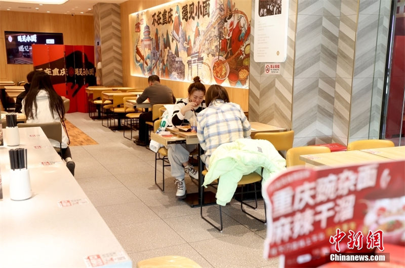 Beijing: servi?os de catering retomam opera??o