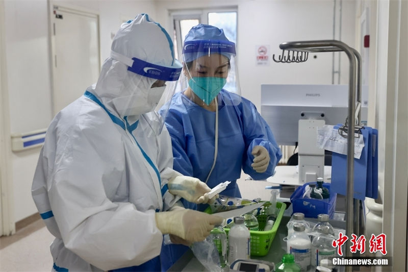 Hospitais de Beijing se esfor?am para garantir tratamento