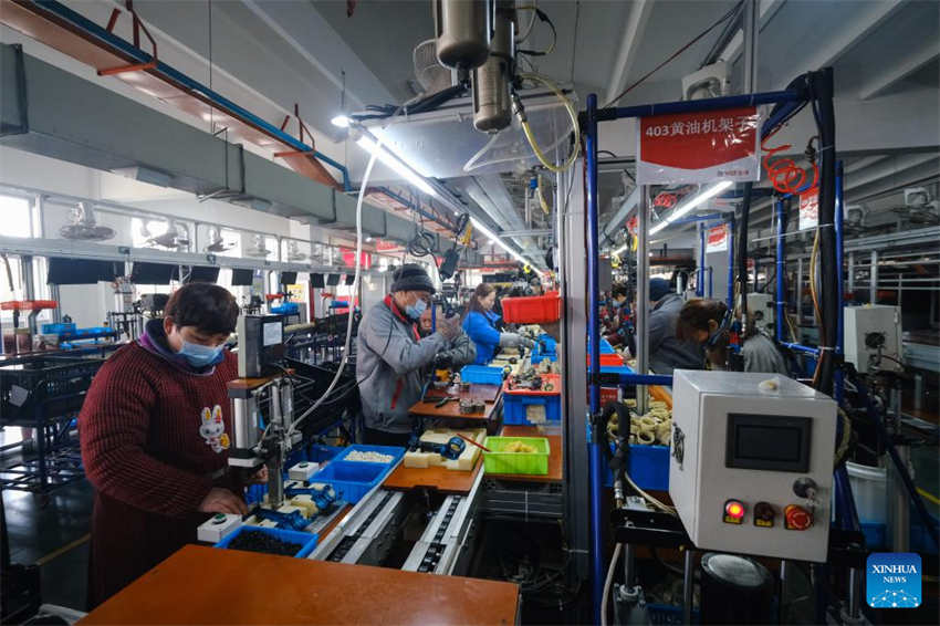 Empresas no leste da China aceleram produ??o durante Festival da Primavera