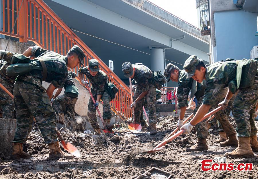 Servi?os de resgate e socorro intensificados decorrem em Chongqing após inunda??es
