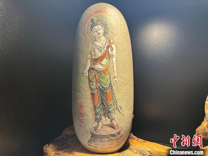 Lanzhou: exibi??o de gravuras ilustrativas da Rota da Seda atraem numerosos visitantes