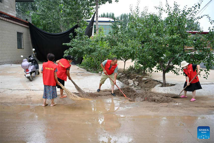 Regi?es atingidas por inunda??es no norte da China acelem reloca??o pós-desastre