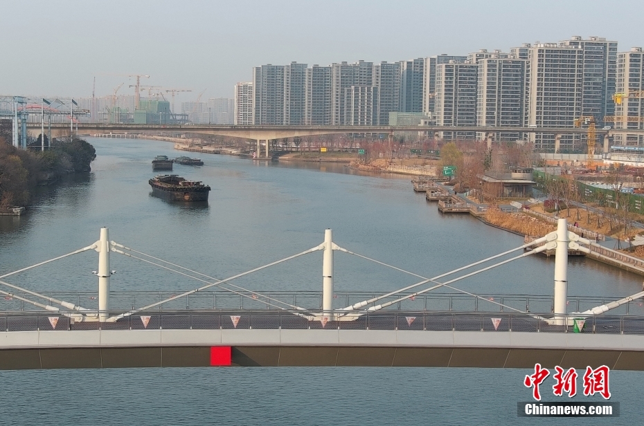 Constru??o da ponte em treli?a invertida de maior v?o do mundo é concluída no leste da China