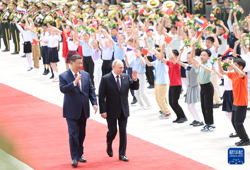 Xi Jinping e Putin realizam conversa??es em Beijing, tra?ando rumo para fortalecer la?os