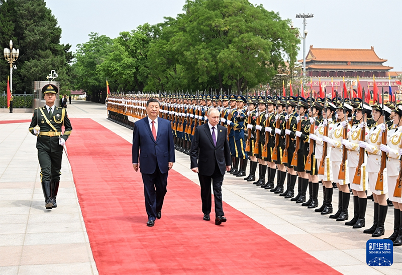 Xi Jinping e Putin realizam conversa??es em Beijing, tra?ando rumo para fortalecer la?os