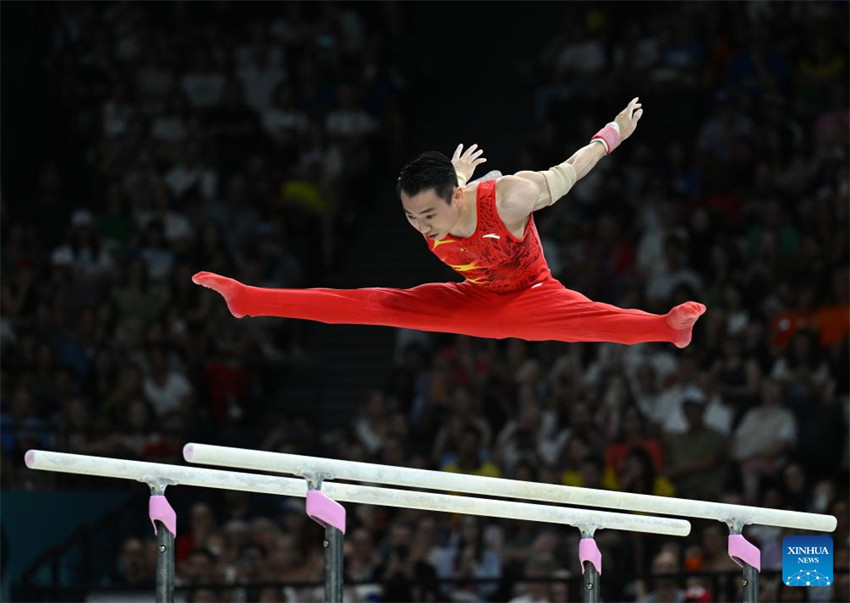 Pairs 2024: Zou Jingyuan é bicampe?o olímpico nas barras paralelas da ginástica artística
