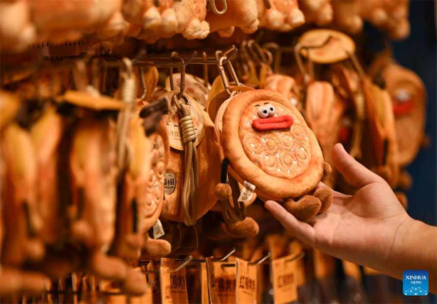 Técnicas tradicionais de fabrica??o de naan herdadas e desenvolvidas em Xinjiang